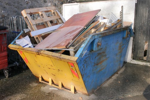 Business professionals managing waste in Ruislip office