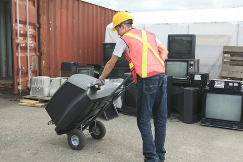 Low-carbon van at a transfer station for sustainable rubbish removal